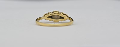 Lot 15 - An 18ct gold opal and diamond dress ring
