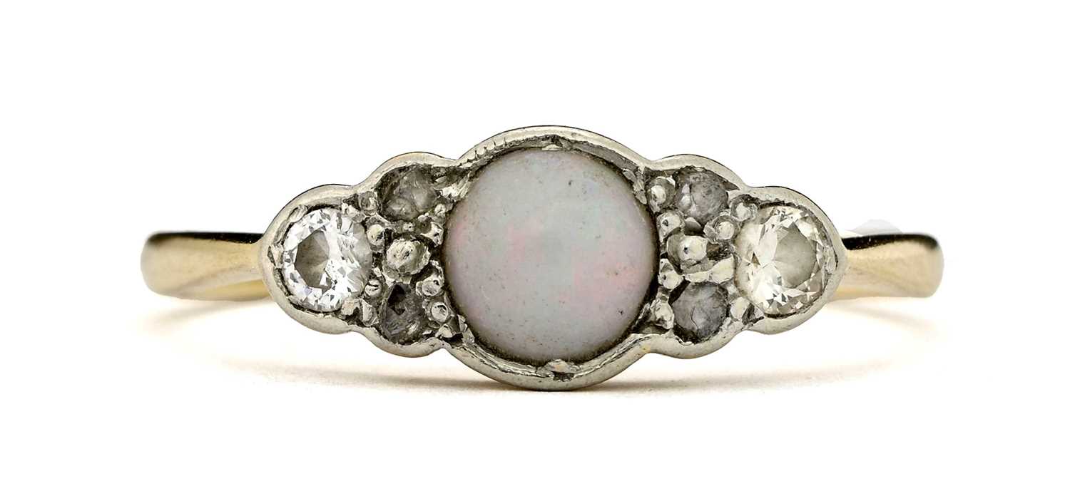 Lot 15 - An 18ct gold opal and diamond dress ring