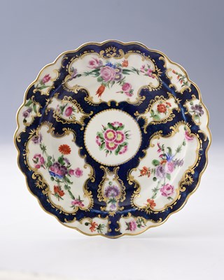 Lot 646 - Worcester, a scalloped blue fish scale plate,...