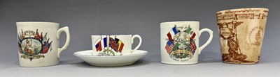 Lot 214 - A collection of World War I commemorative mugs,...