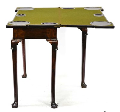 Lot 318 - A George III mahogany games table, circa 1770,...