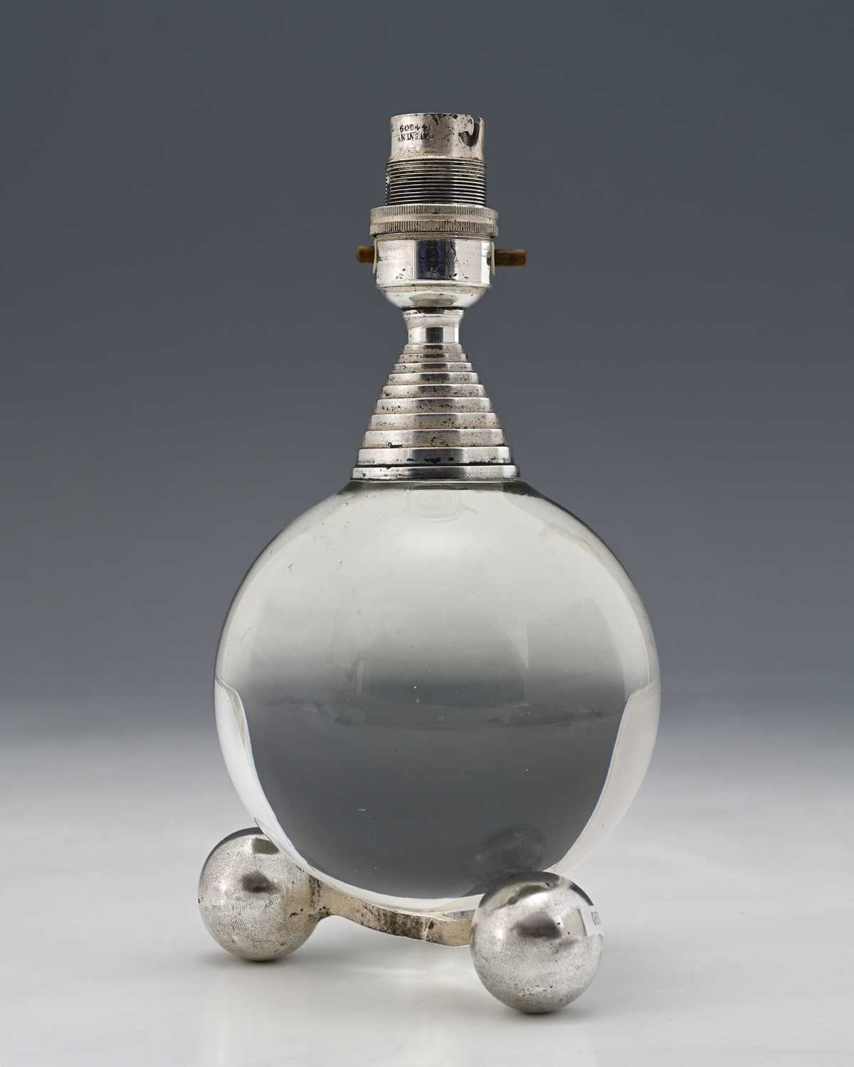 Lot 101 - An American Modernist chrome metal and glass...