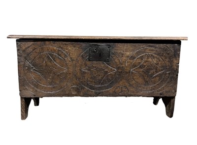 Lot 986 - A 16th century or earlier oak plank chest or...