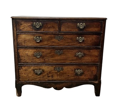 Lot 979 - An 18th century mahogany chest of two short...