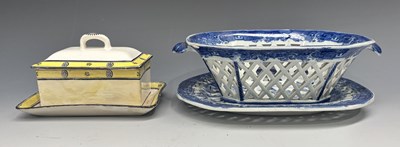 Lot 303 - A late 18th century English creamware butter...