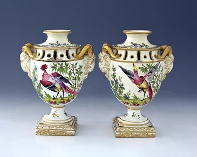 Lot 633 - A pair of Fancy Bird painted rams head...