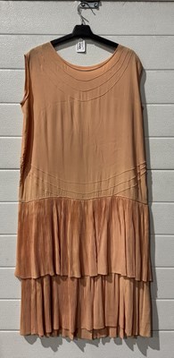 Lot 990 - A 1920's/30's style Flapper dress in a peach...