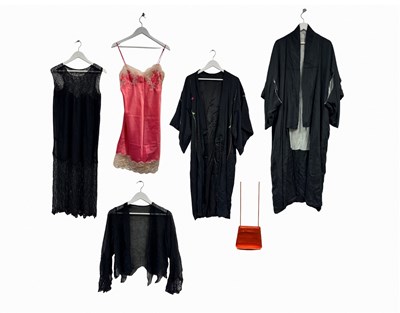 Lot 6 - An early 20th century black silk kimono...
