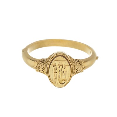 Lot 17 - John Brogden, a late Victorian Revivalist silver gilt bangle bracelet