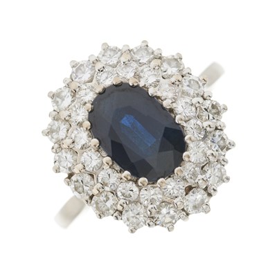 Lot 35 - An 18ct gold sapphire and diamond cluster dress ring