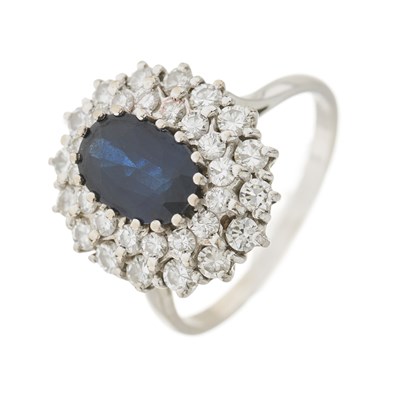 Lot 35 - An 18ct gold sapphire and diamond cluster dress ring