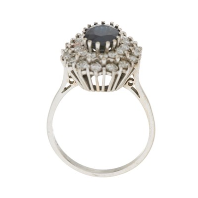 Lot 35 - An 18ct gold sapphire and diamond cluster dress ring