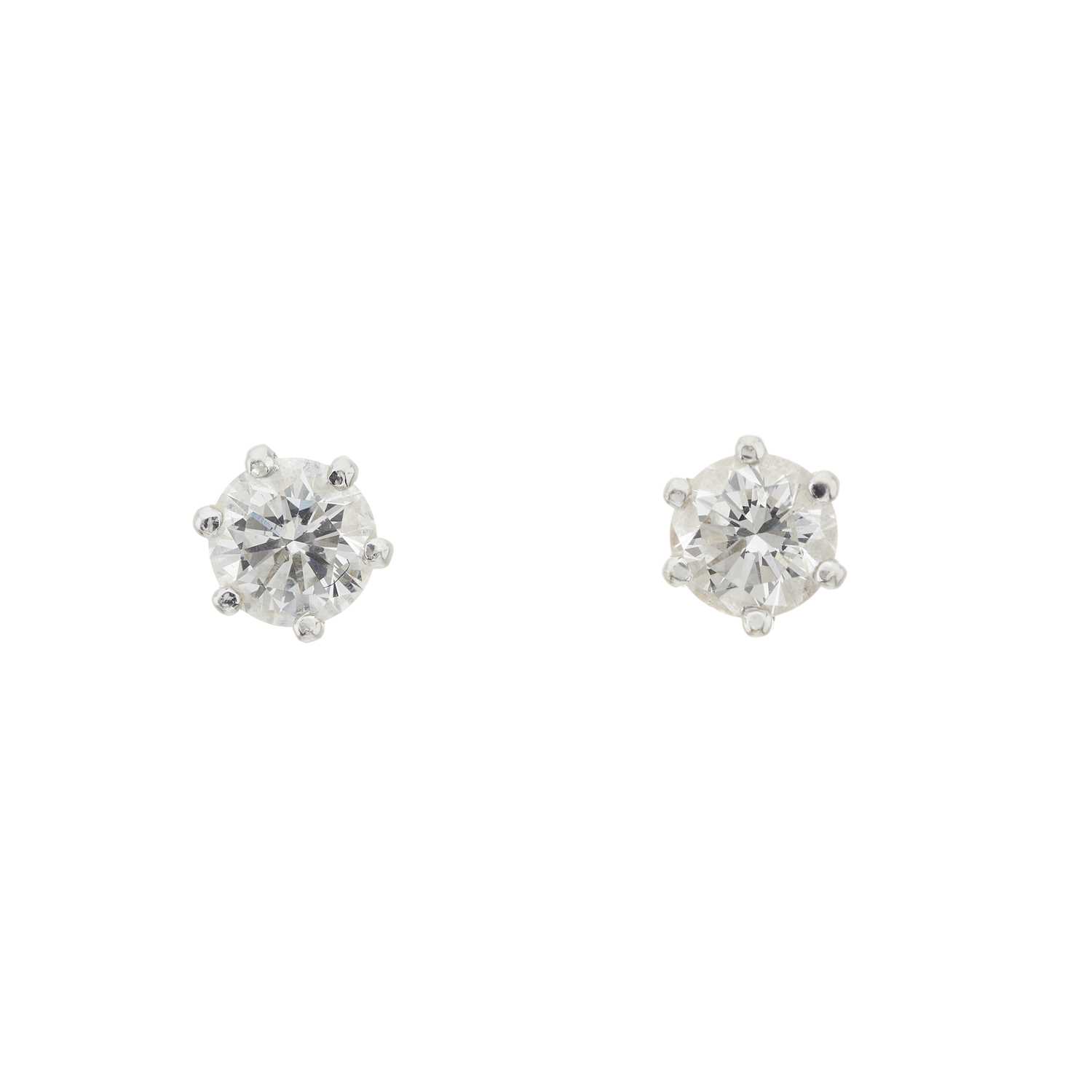 Lot 54 - A pair of 18ct gold brilliant-cut diamond single-stone stud earrings