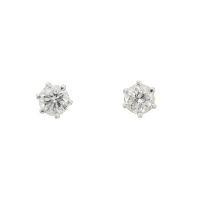 Lot 54 - A pair of 18ct gold brilliant-cut diamond single-stone stud earrings