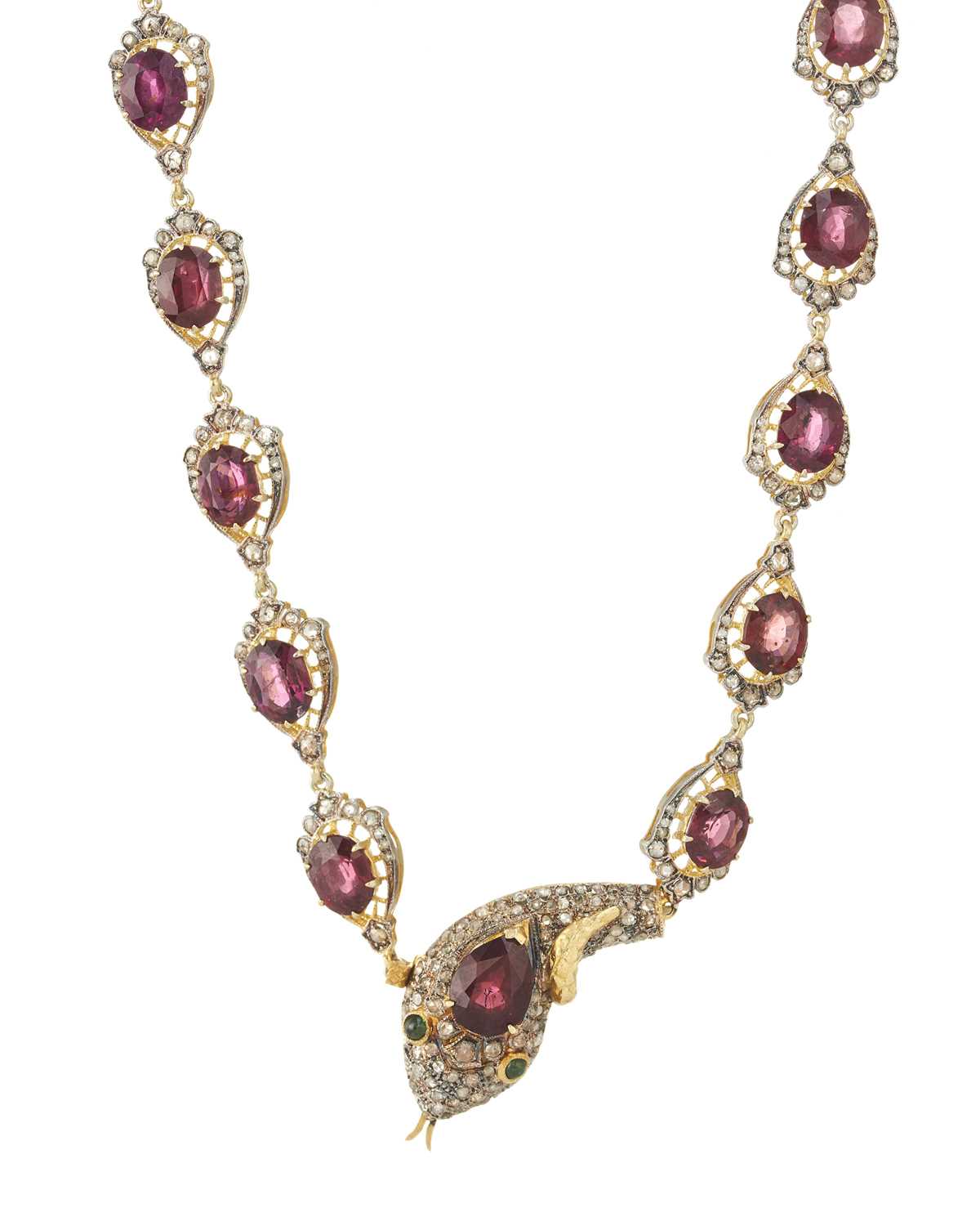 Lot 94 - A bi-colour garnet, diamond and emerald snake necklace