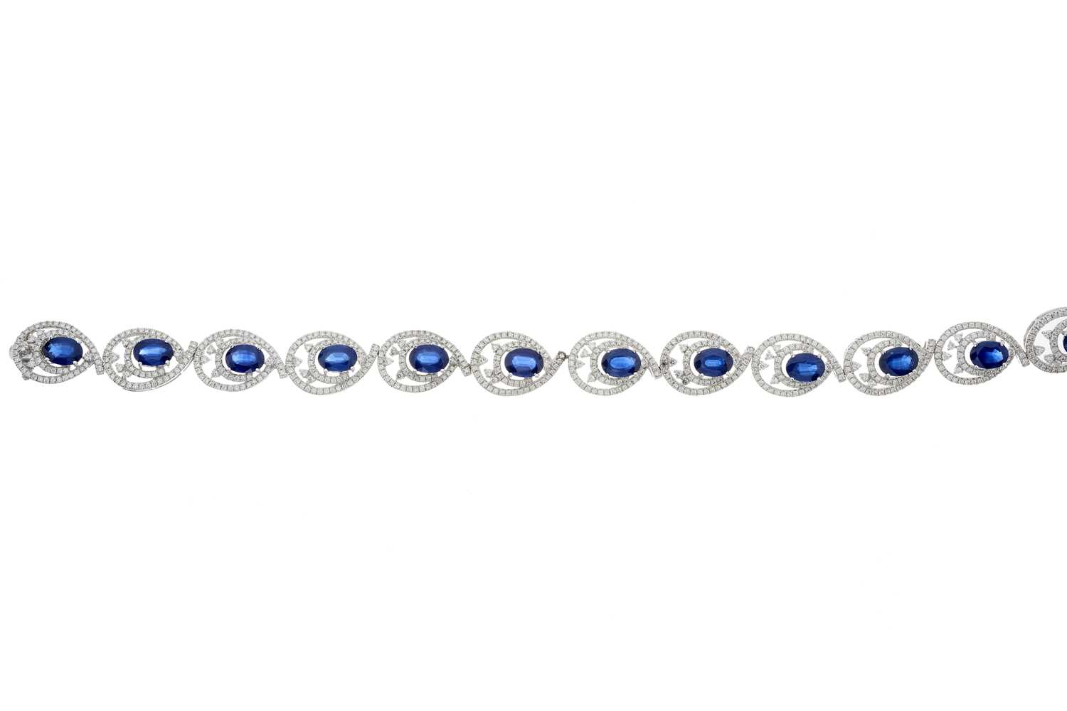 Lot 78 - An 18ct gold sapphire and diamond bracelet