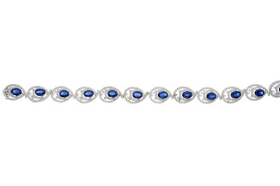Lot 78 - An 18ct gold sapphire and diamond bracelet