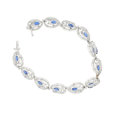 Lot 78 - An 18ct gold sapphire and diamond bracelet