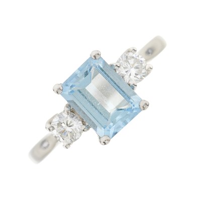 Lot 106 - An 18ct gold aquamarine and diamond three-stone ring
