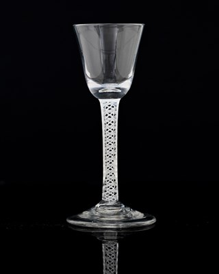 Lot 401 - An opaque twist wine glass, circa 1760, the...