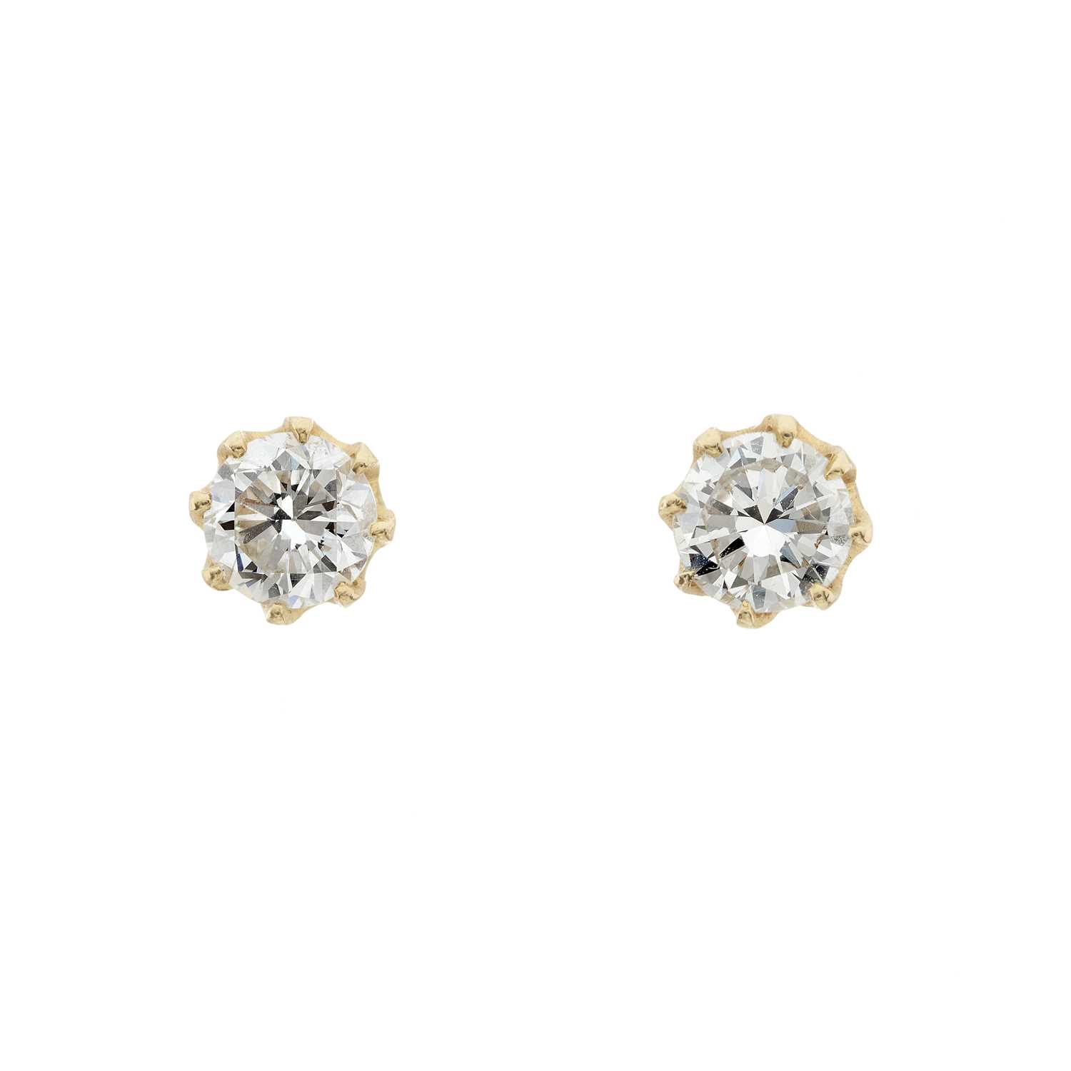Lot 29 - A pair of gold diamond single-stone stud earrings