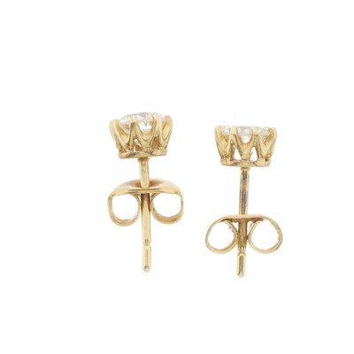 Lot 29 - A pair of gold diamond single-stone stud earrings