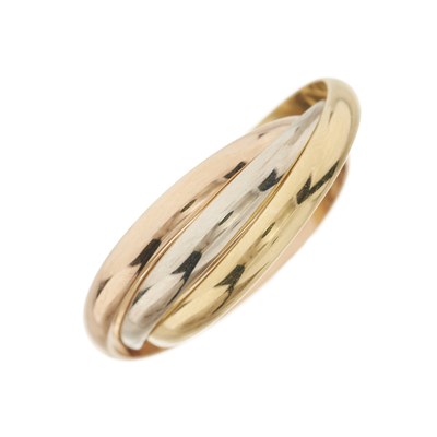 Lot 134 - Cartier, an 18ct tri-colour gold Trinity band ring