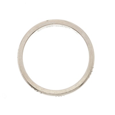 Lot 56 - Cartier, an 18ct white gold Happy Birthday logo band ring