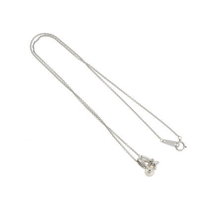 Lot 57 - Mikimoto, an 18ct white gold pearl and diamond flower necklace