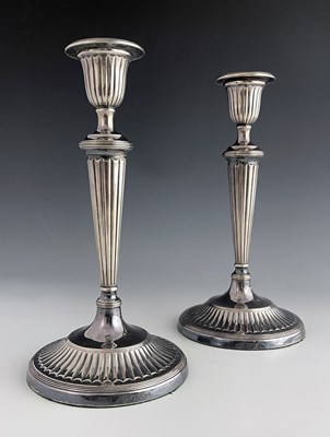 Lot 61 - A pair of Elizabeth II silver candlesticks, C...