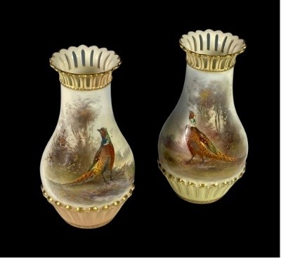 Lot 236 - A small pair of Royal Worcester vases, painted...