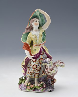 Lot 662 - Bow, a porcelain figure of Juno, circa 1760,...