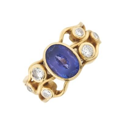 Lot 118 - An 18ct gold tanzanite and diamond dress ring
