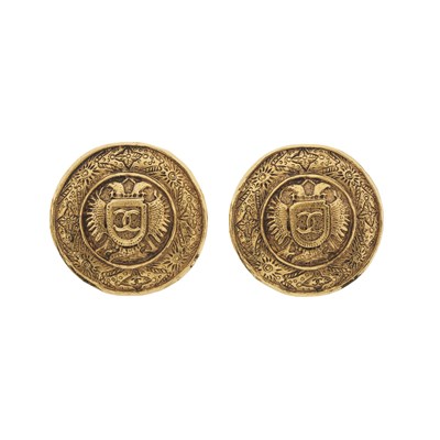 Lot 311 - Chanel, a pair of large vintage gold-pated clip-on earrings.