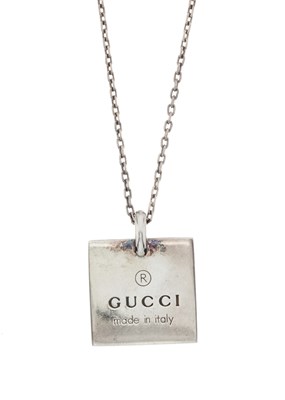Lot 381 - Gucci, a silver pendant necklace.
