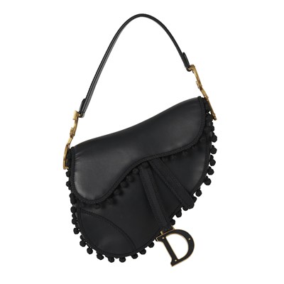 Lot 322 - Christian Dior, a calfskin Pom Pom Saddle bag.