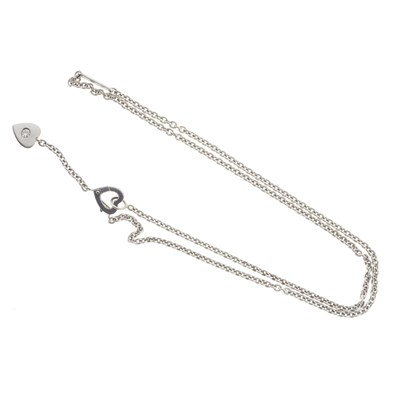 Lot 58 - Cartier, an 18ct gold diamond Mon Amour Heart necklace