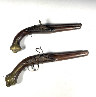 Lot 382 - Two antique flintlock horse pistols, walnut...
