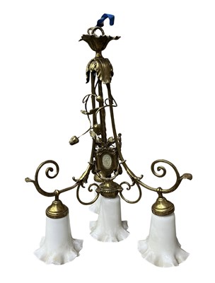 Lot 989A - A brass chandelier, three scrolling arms and...