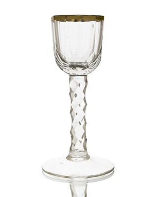 Lot 405 - A gilded facet stem wine glass, circa 1780,...