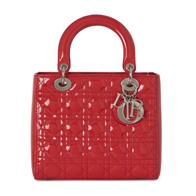 Lot 319 - Christian Dior, a red patent leather Lady Dior MM handbag.