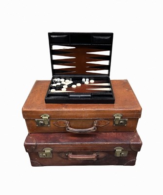 Lot 988 - A Liberty black leather cased backgammon set,...