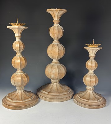 Lot 366 - A limed wood lamp base, formed as three...
