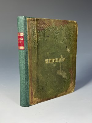 Lot 492 - A 19th century children's arithmetic book with...