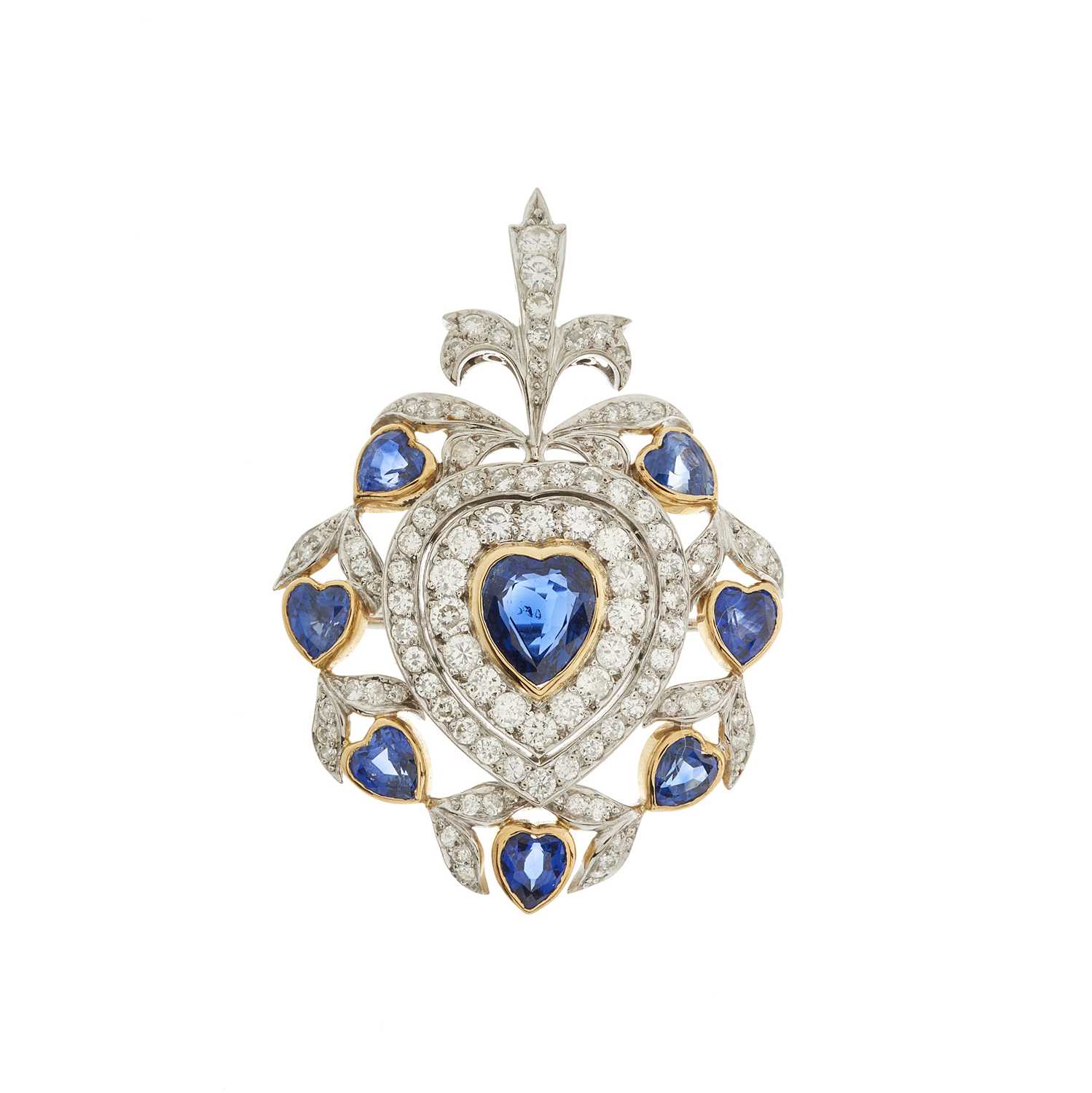 Lot 33 - An 18ct gold heart-shape sapphire and...