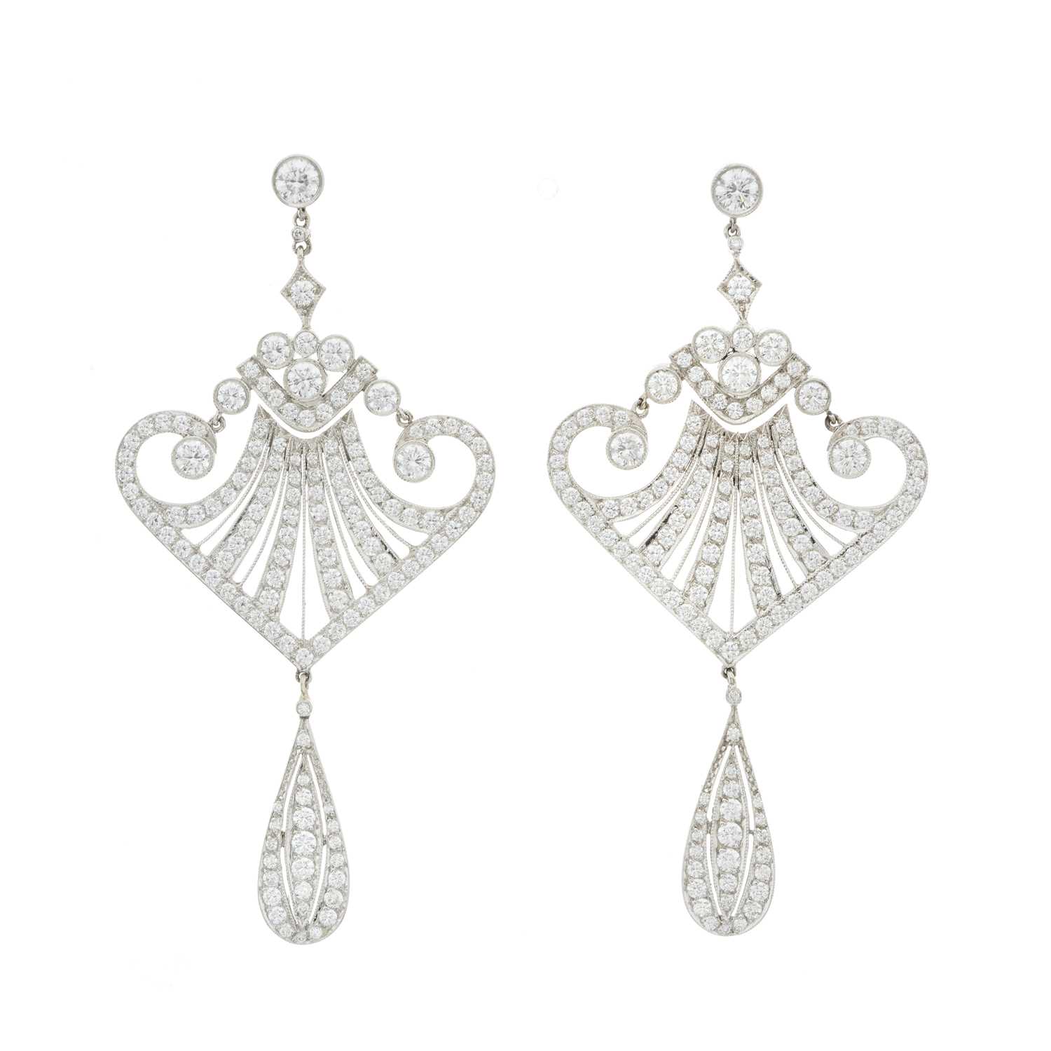 Lot 79 - A pair of platinum diamond drop earrings