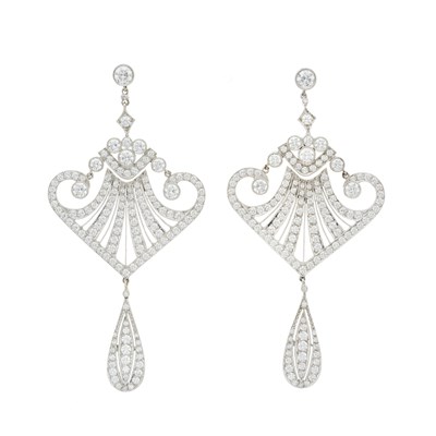 Lot 79 - A pair of platinum diamond drop earrings