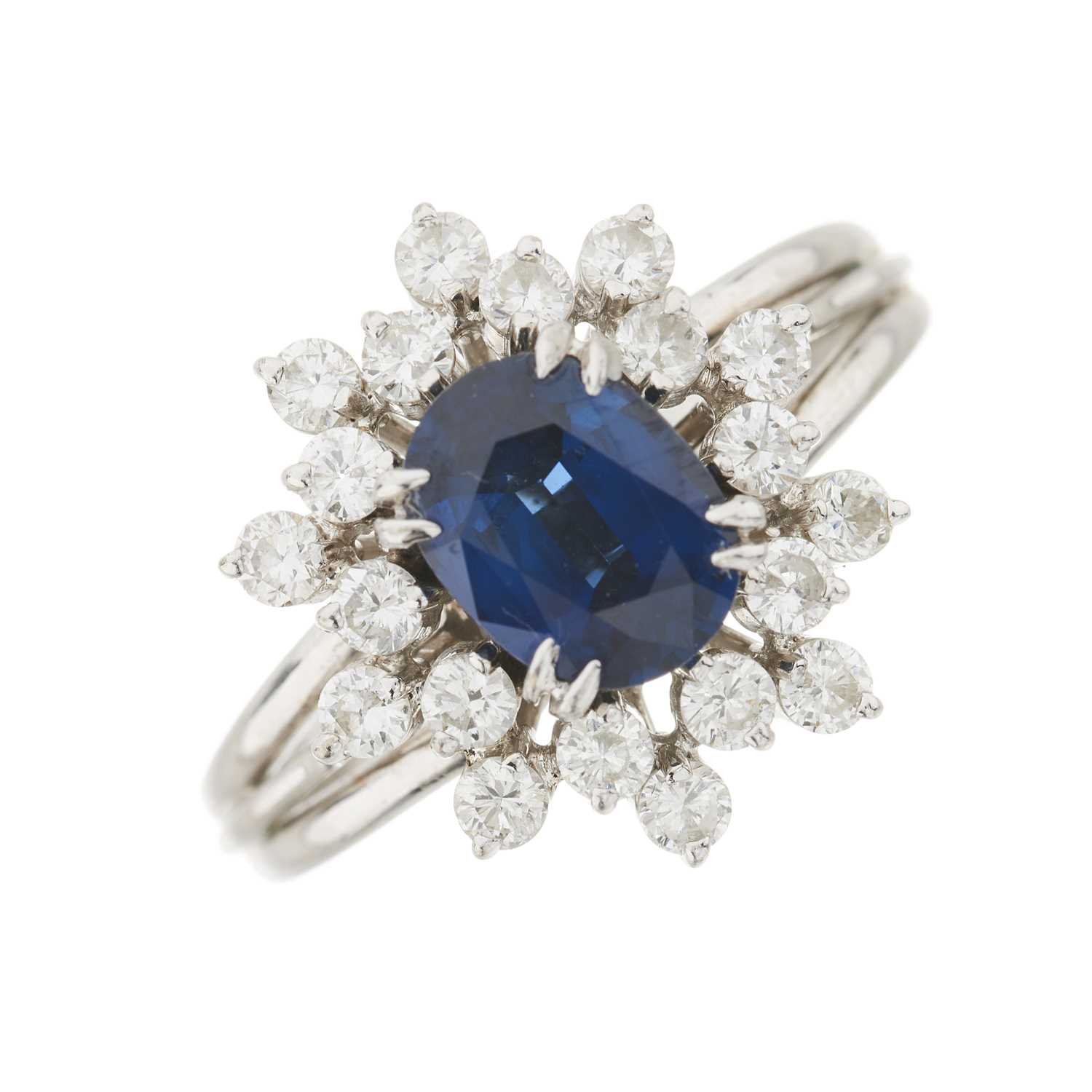 Lot 46 - A sapphire and diamond cluster dress ring