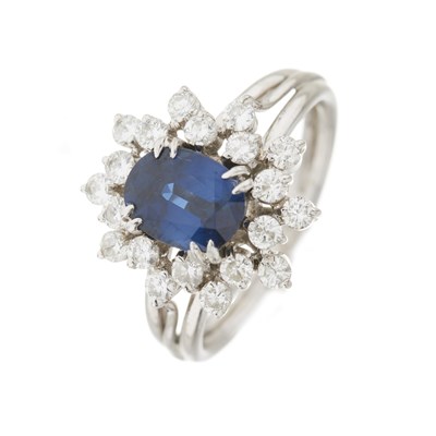 Lot 46 - A sapphire and diamond cluster dress ring