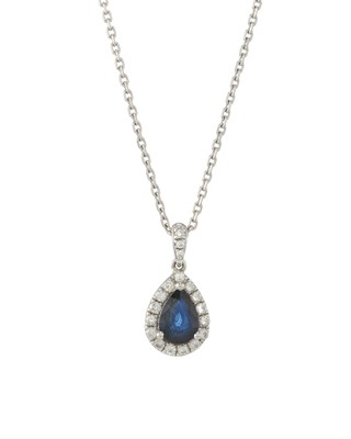 Lot 43 - An 18ct gold sapphire and diamond cluster pendant, with chain